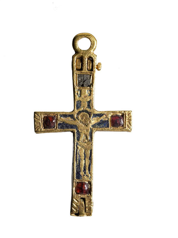 Front of a gold pendant crucifix