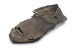 Brown leather shoe: mid 14th century