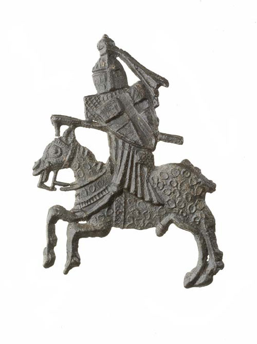 Pewter badge of a jousting knight
